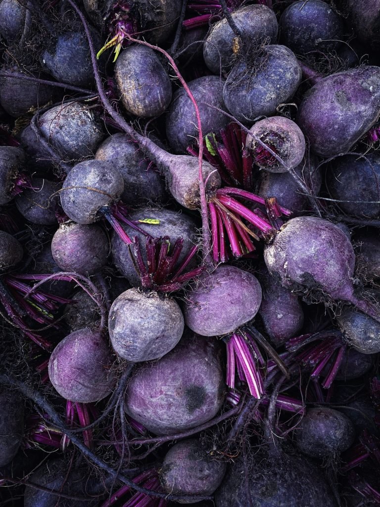 A pile of fresh purple beetroots