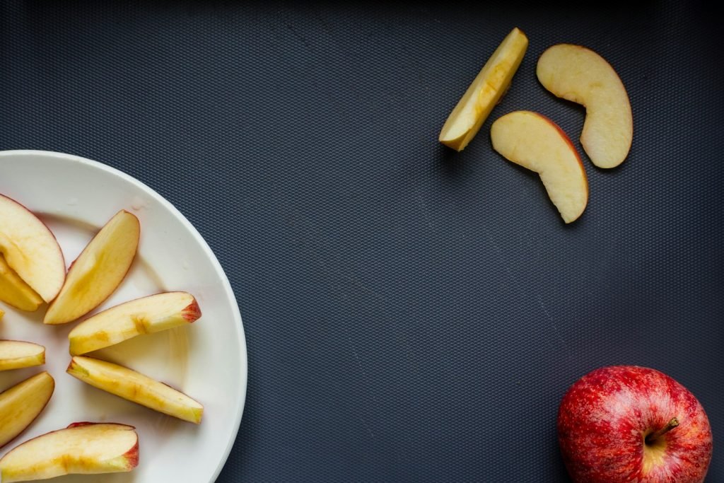 Sliced banana on a white plate